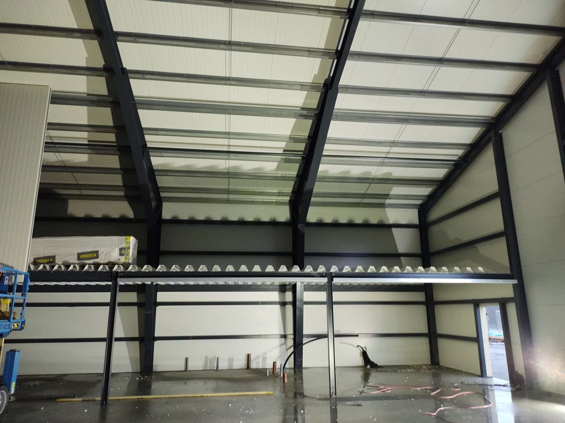 Steel mezzanine with a composite metal deck inside a building