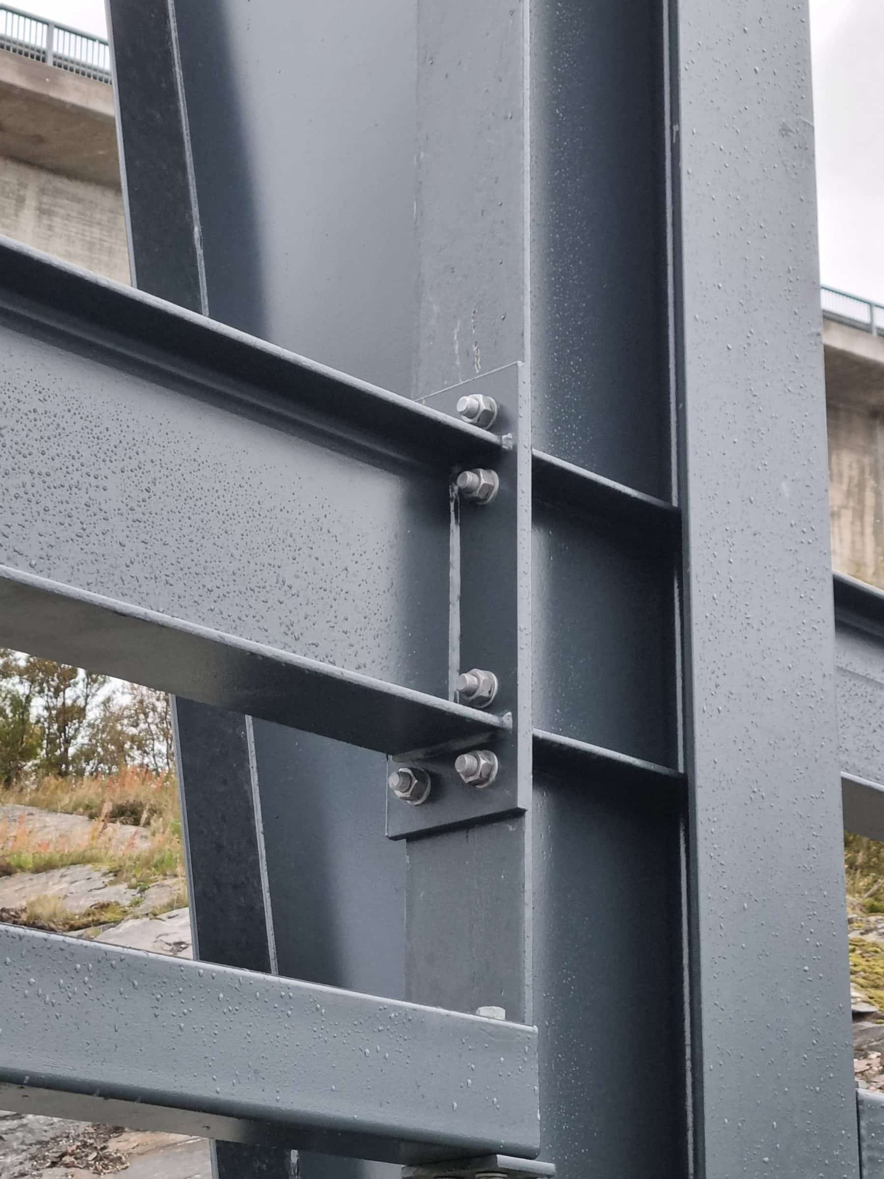 Detail of a bolted connection between a rail and a steel column
